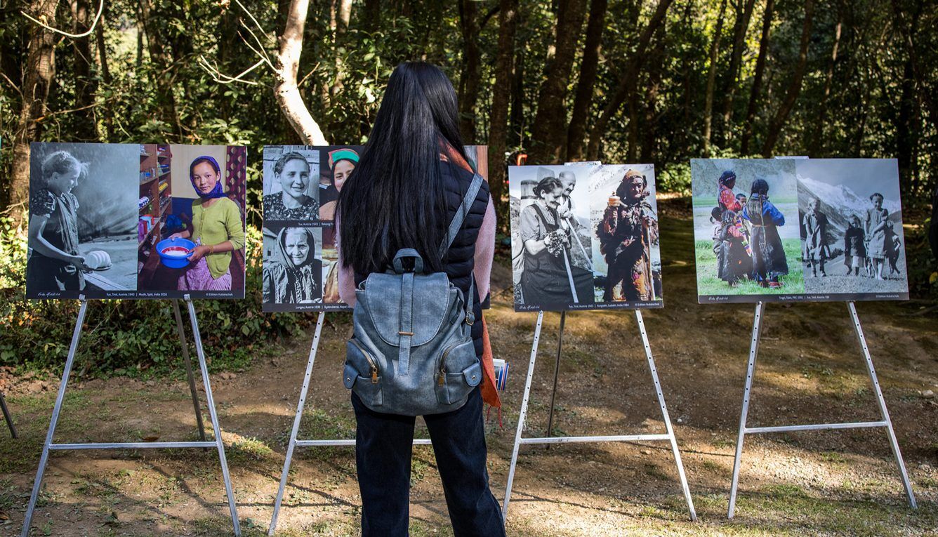 A woman browses through the 'Alps meet the HKH'