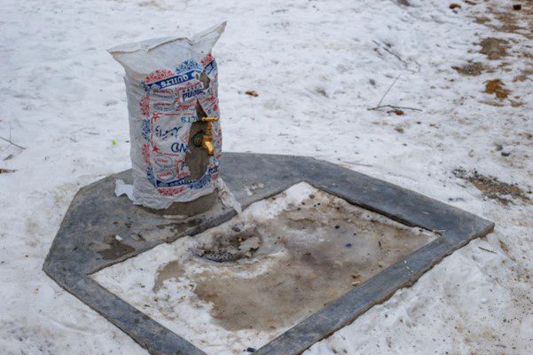 A frozen water tap